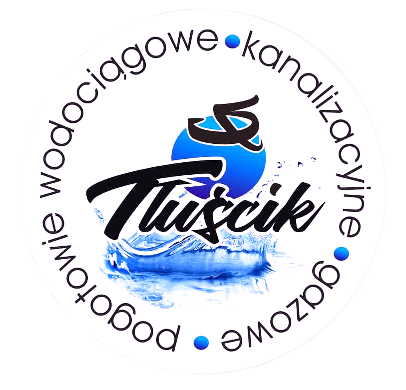 A man in a blue shirt with a happy expression