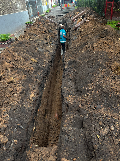 A macintosh on a yellow background.