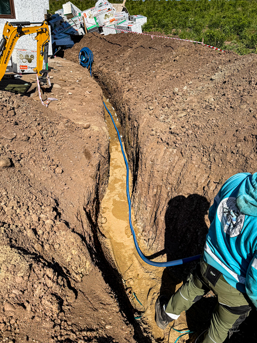 On a Blue background, a Wacom and a mouse.